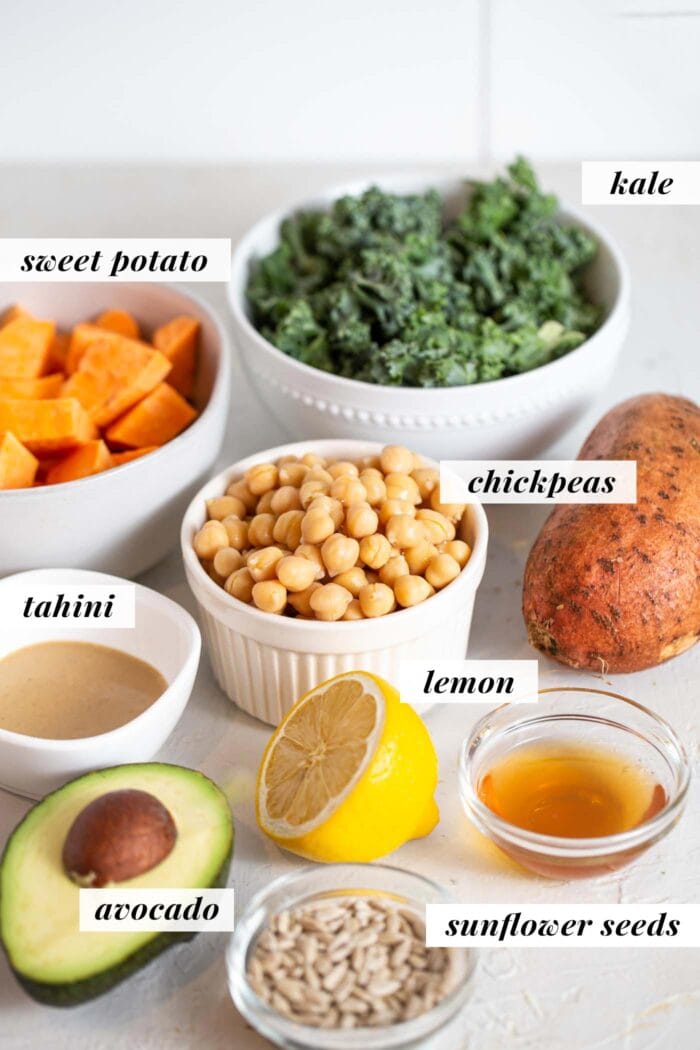 Labelled ingredients for a roasted sweet potato and chickpea kale salad.