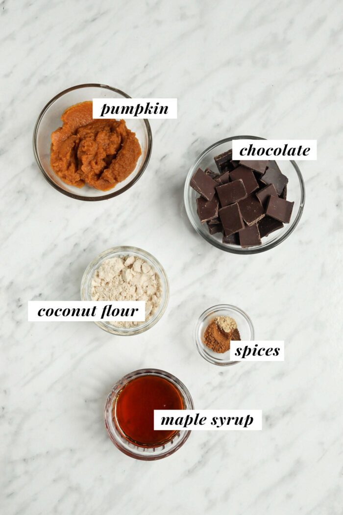 Visual list of ingredients for making vegan chocolate pumpkin truffles.