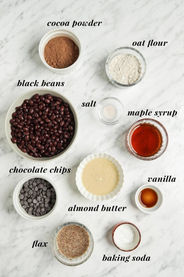 Visual ingredient list for making vegan black bean brownies.