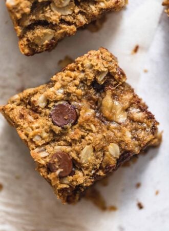 Close up of an oatmeal banana cookie bar with chocolate chips in it.